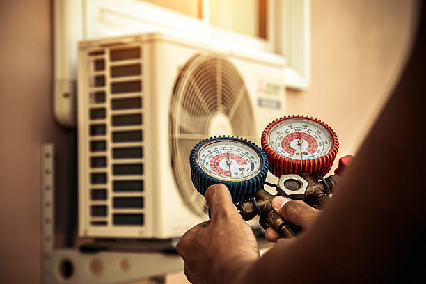 Professional Hvac technician working in Bassett, WI